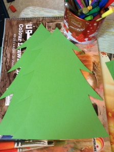 The cut out green colored paper